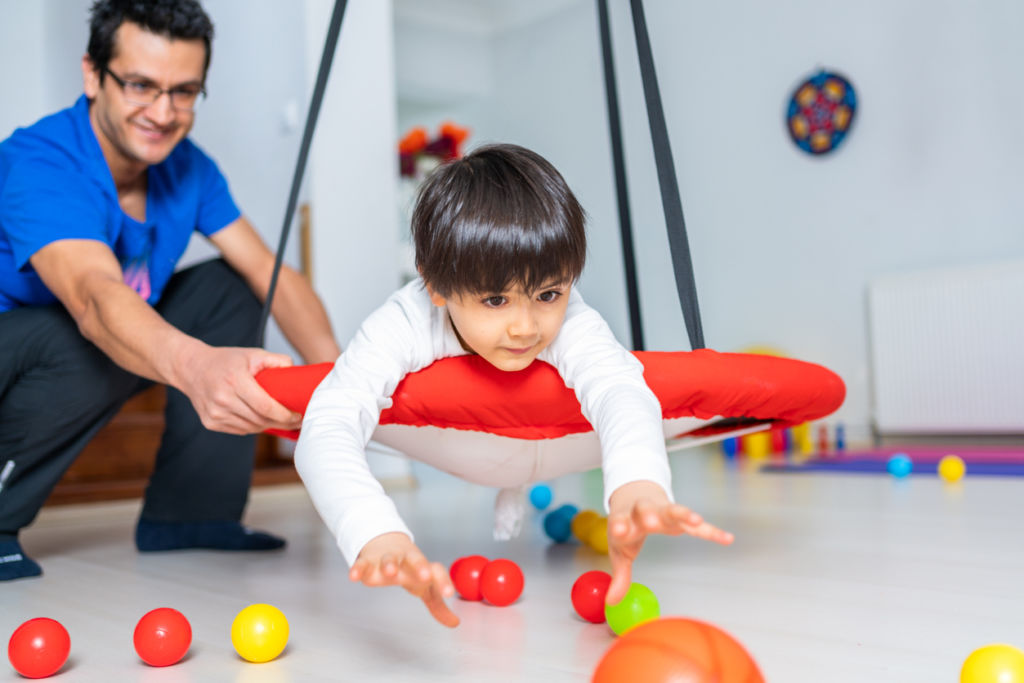 Child engaged in occupational therapy session