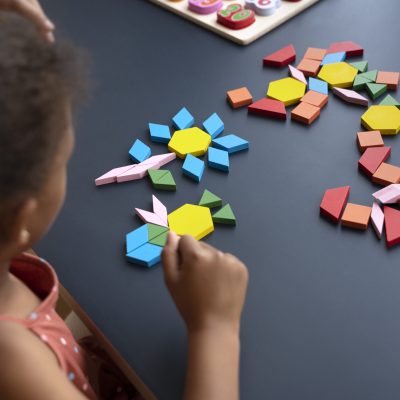 autistic girl making puzzle